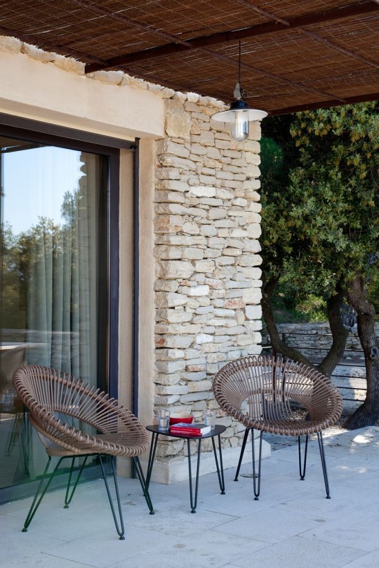 Vincent Sheppard Roy Cocoon Tuinstoelen Zwart Stalen frame Camel Wicker koord Polyethyleen.